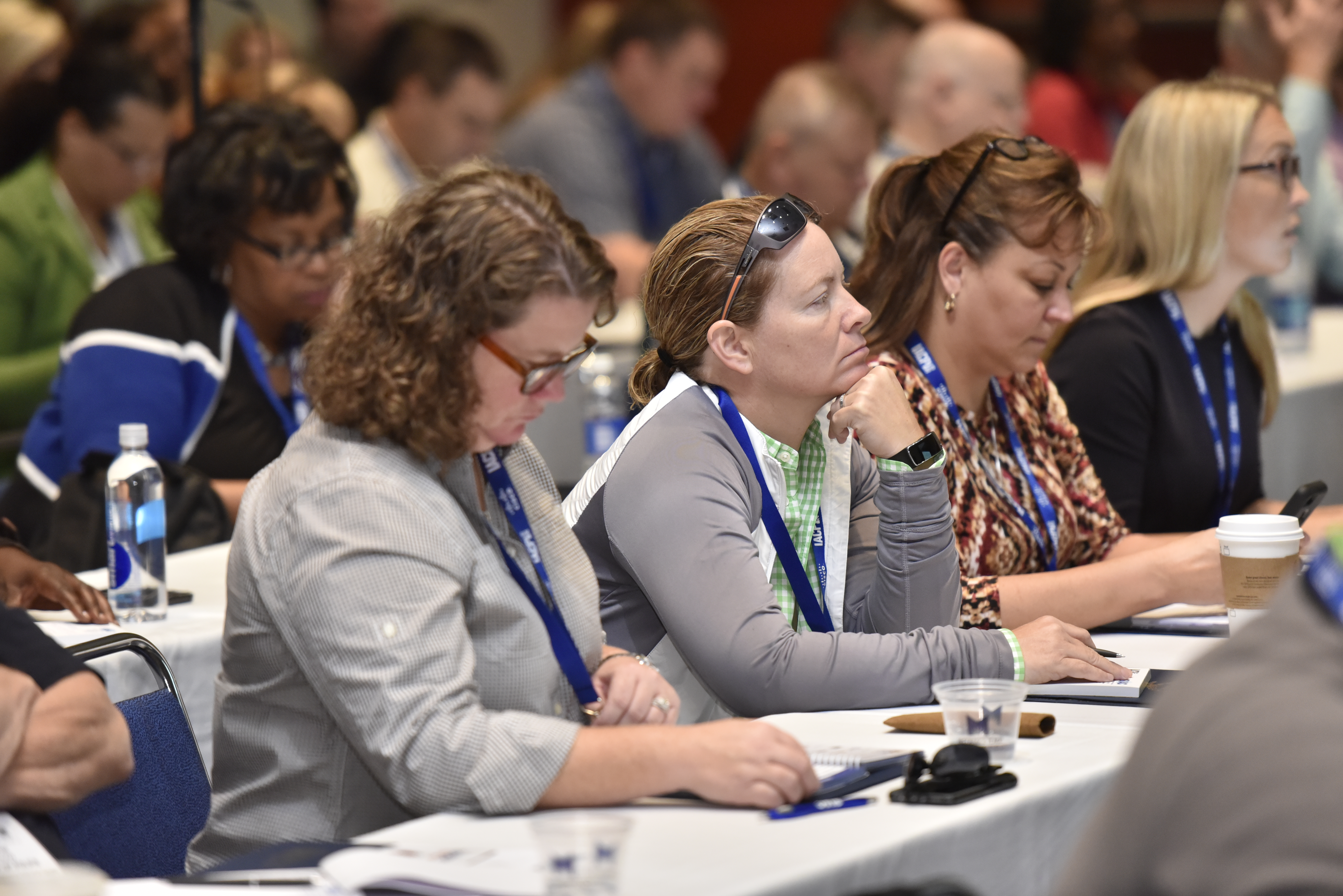 Attendees look on during a packed session on developing women leaders in law enforcement