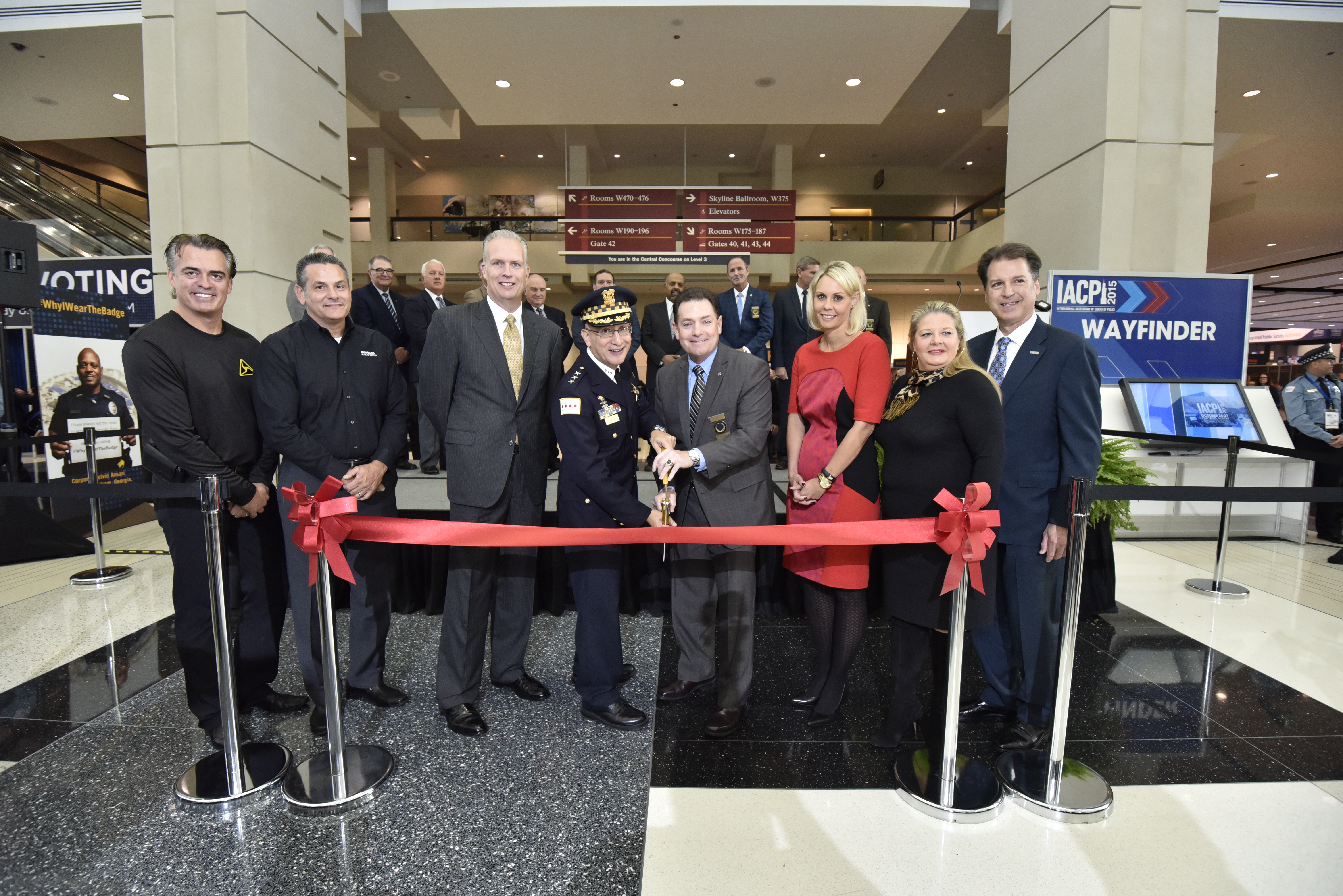 Chicago Police First Deputy Superintendent John Escalante, IACP President Richard Beary, and IACP Platinum Sponsors cut the ribbon to open the 2015 Exposition Hall. 